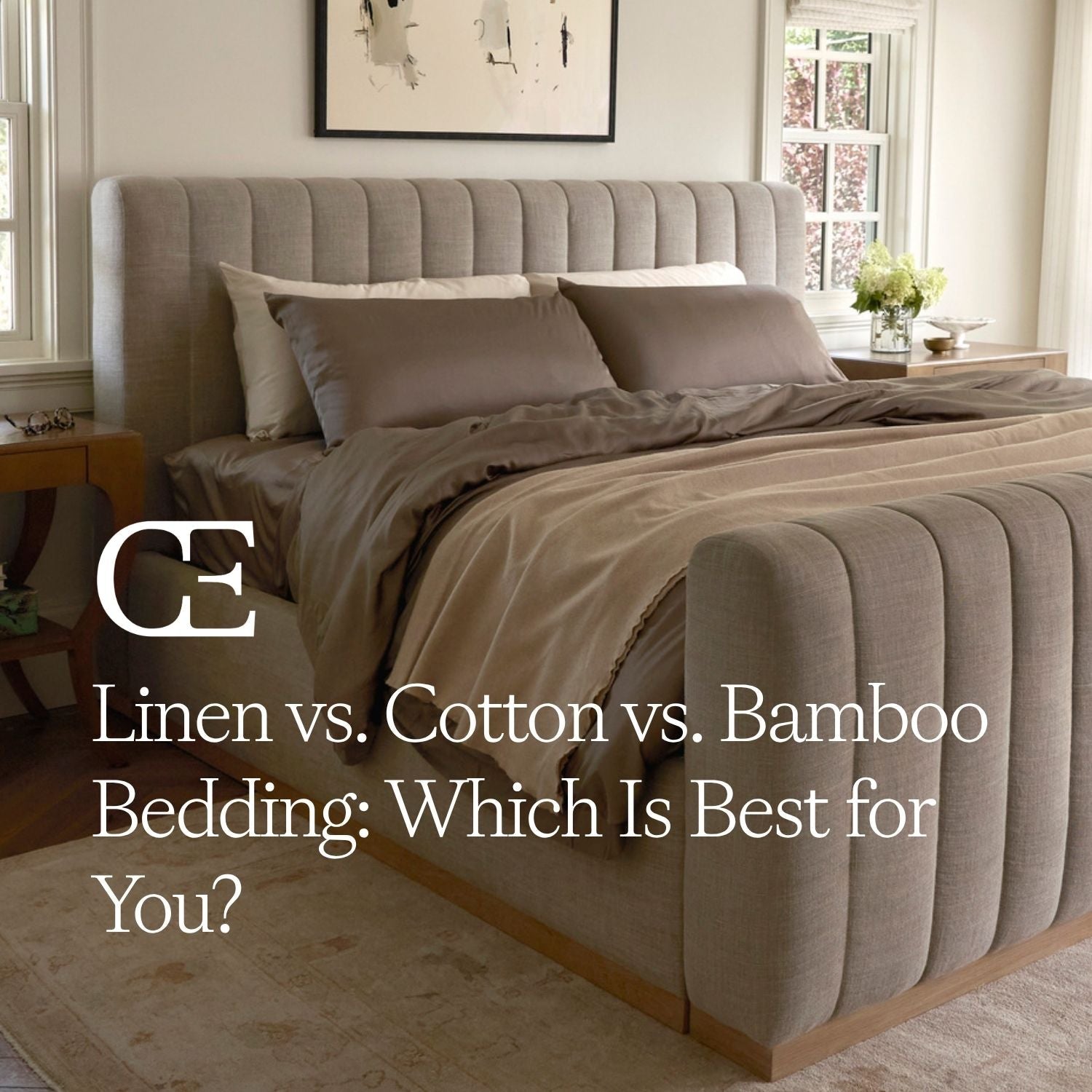 a bed featuring neutral toned bedding