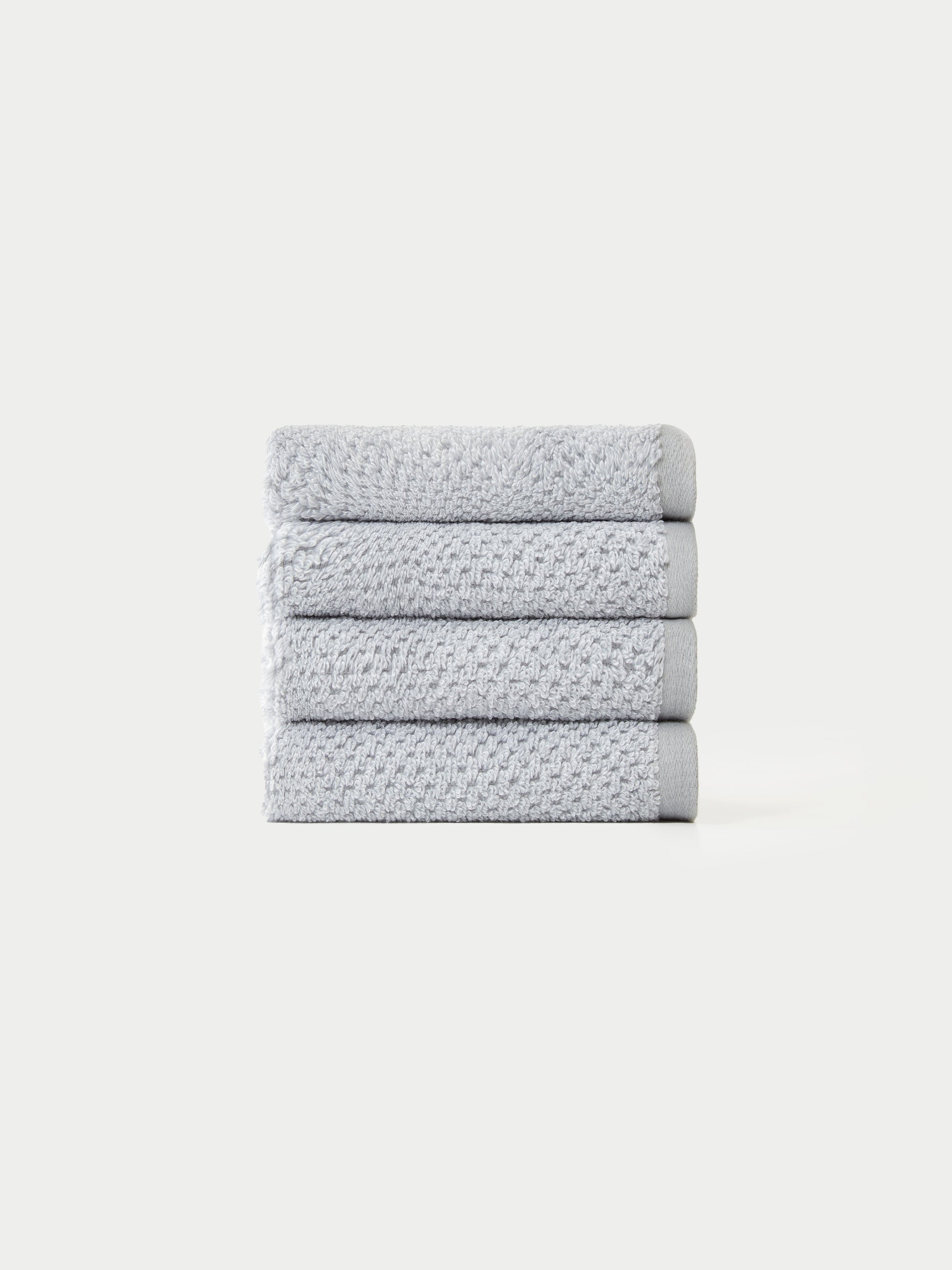 Nantucket Wash Cloths in the color Heathered Harbor Mist. The Wash Cloths are neatly folded. The photo of the wash cloths was taken with a white background.