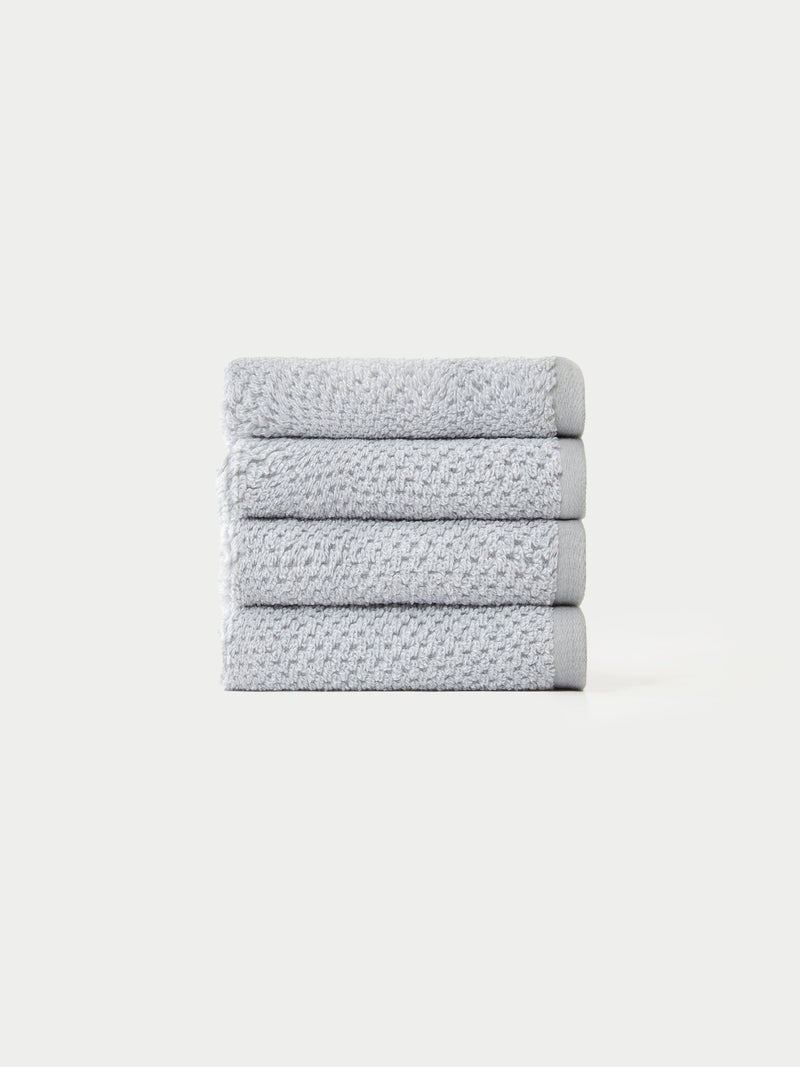 Nantucket Wash Cloths in the color Heathered Harbor Mist. The Wash Cloths are neatly folded. The photo of the wash cloths was taken with a white background.
