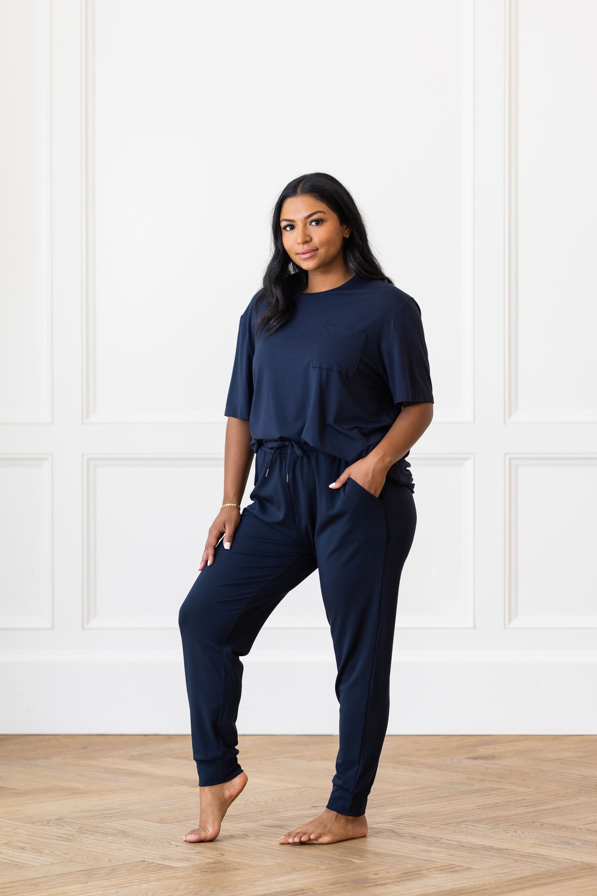 Woman wearing Cozy Earth Bamboo Lounge Tee in dark blue 