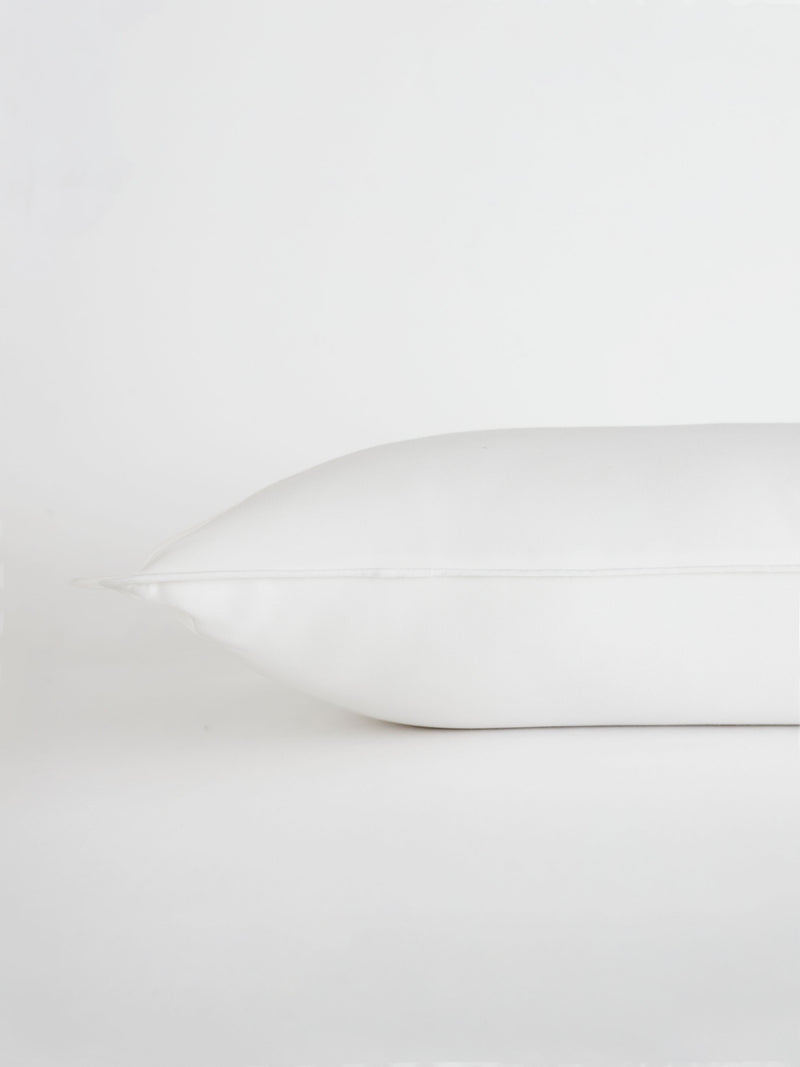 Travel size down pillow with white background