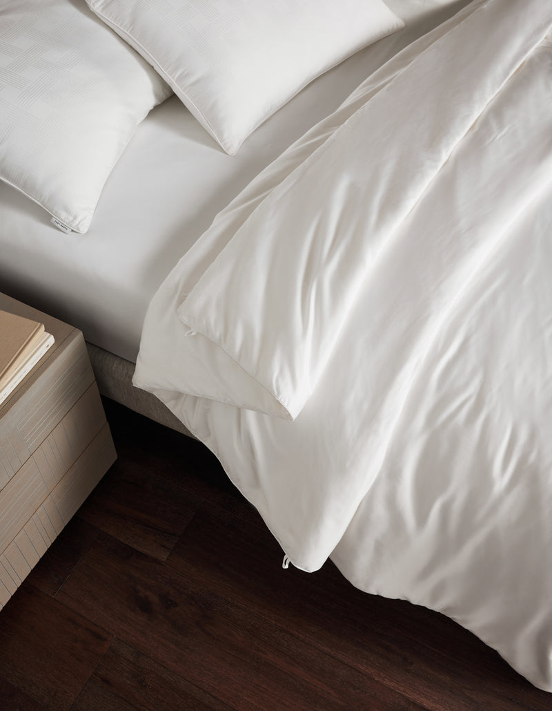 Silk comforter to be paired with Dove Grey, Charcoal, Creme, Driftwood, Flax, Light Grey, Oat, Pacific Blue, Shore, Walnut, Laurel, Peony, Classic Stripe in Pacific, Classic Stripe in Ebony, Classic Stripe in Laurel, Baja Stripe in Maple, Baja Stripe in Laurel, Mulberry, River, or White duvet cover.