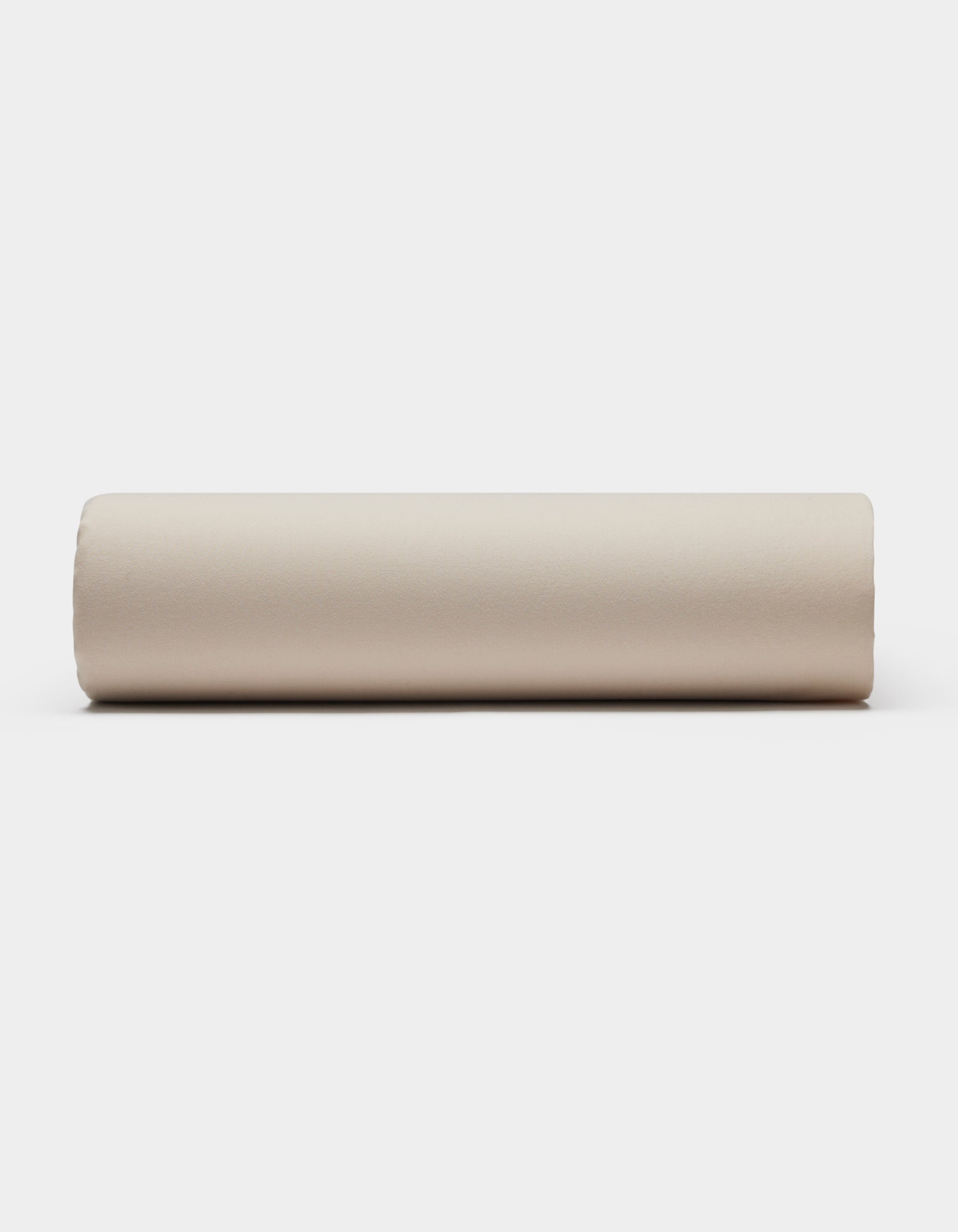 A Soft-Wash Cotton Fitted Sheet by Cozy Earth is displayed flat on a plain white background.|Color:Driftwood