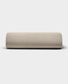 The Bamboo Jersey Fitted Sheet by Cozy Earth, shown in light beige with a smooth fabric texture, is displayed against a plain white background.|Color:Driftwood