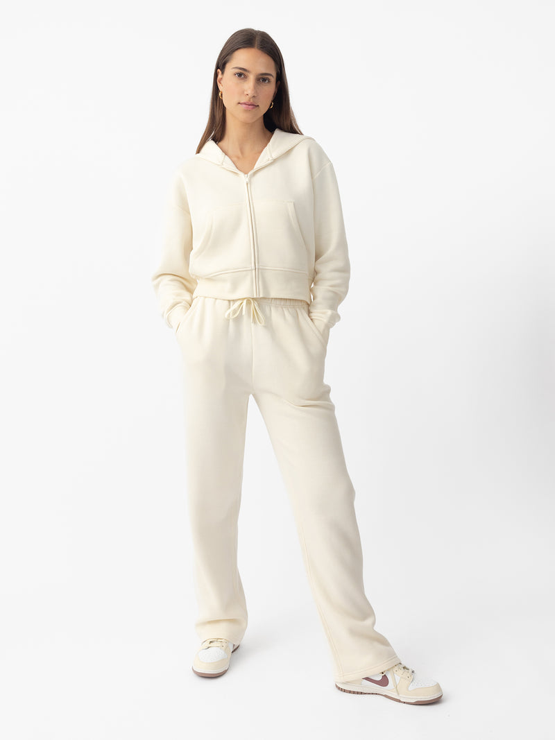 Woman wearing Alabaster CityScape Cropped Full Zip with white background