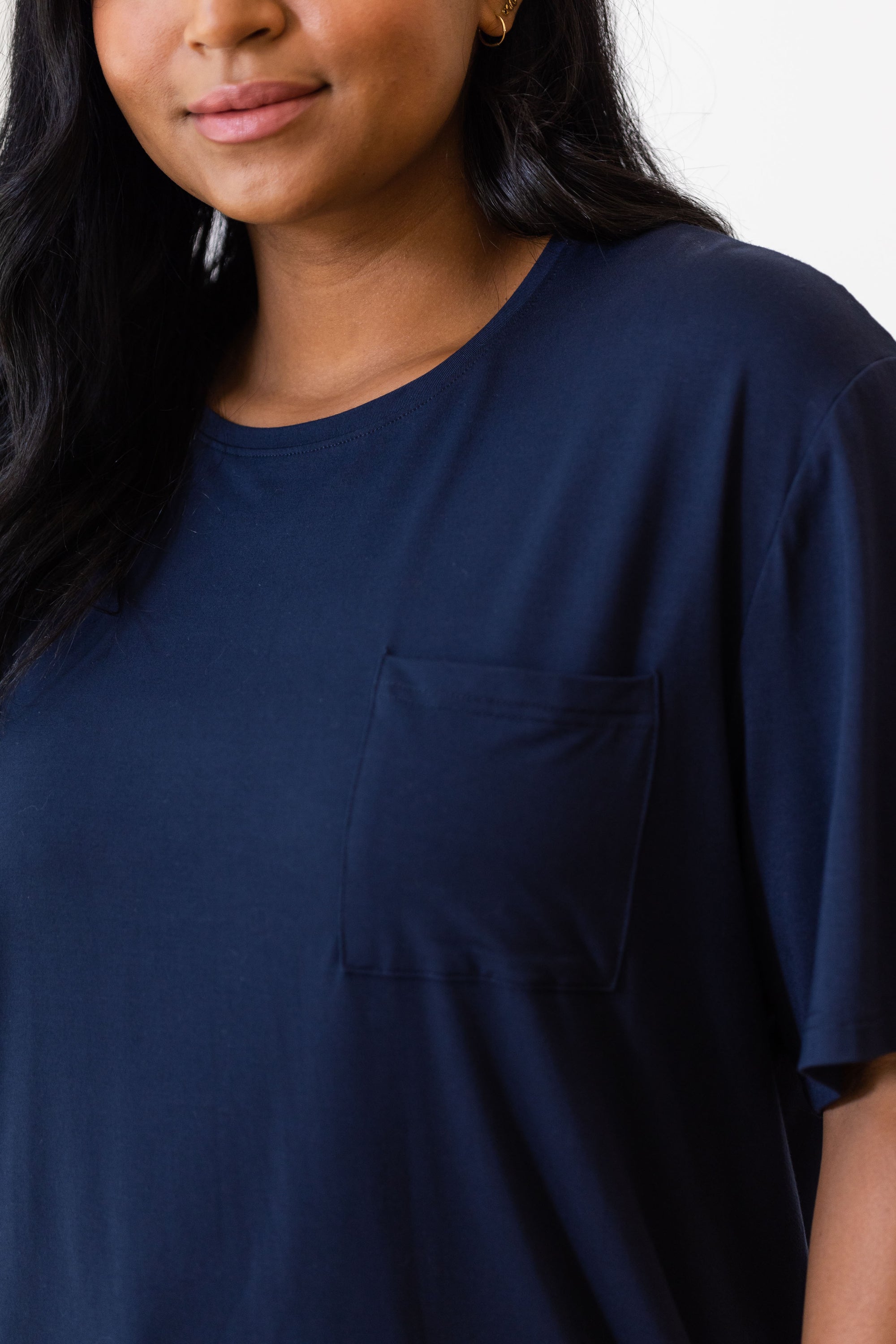 Woman wearing Cozy Earth Bamboo Lounge Tee in dark blue 