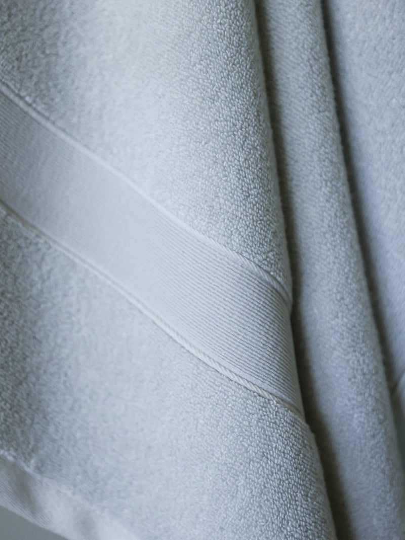 Close up of light grey luxe towel