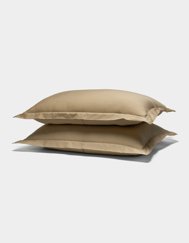 Two Cozy Earth Soft-Wash Cotton Shams in beige are stacked against a plain white background.