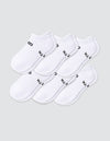 Six pairs of Cozy Earth Women's Essential Ankle Socks in white, featuring black text near the elastic opening, are arranged in two overlapping rows on a light gray background.|Color:White