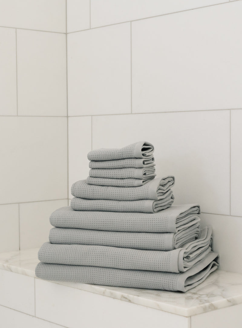 Complete Waffle Bath Bundle in the color Harbor Mist. Photo of Harbor Mist Complete Waffle Bath Bundle taken resting on a marble counter top.