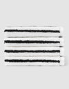 A stack of four neatly folded Cozy Earth Striped Luxe Washcloths in white with evenly spaced black stripes, set against a plain light gray background. |Color:Black Stripe