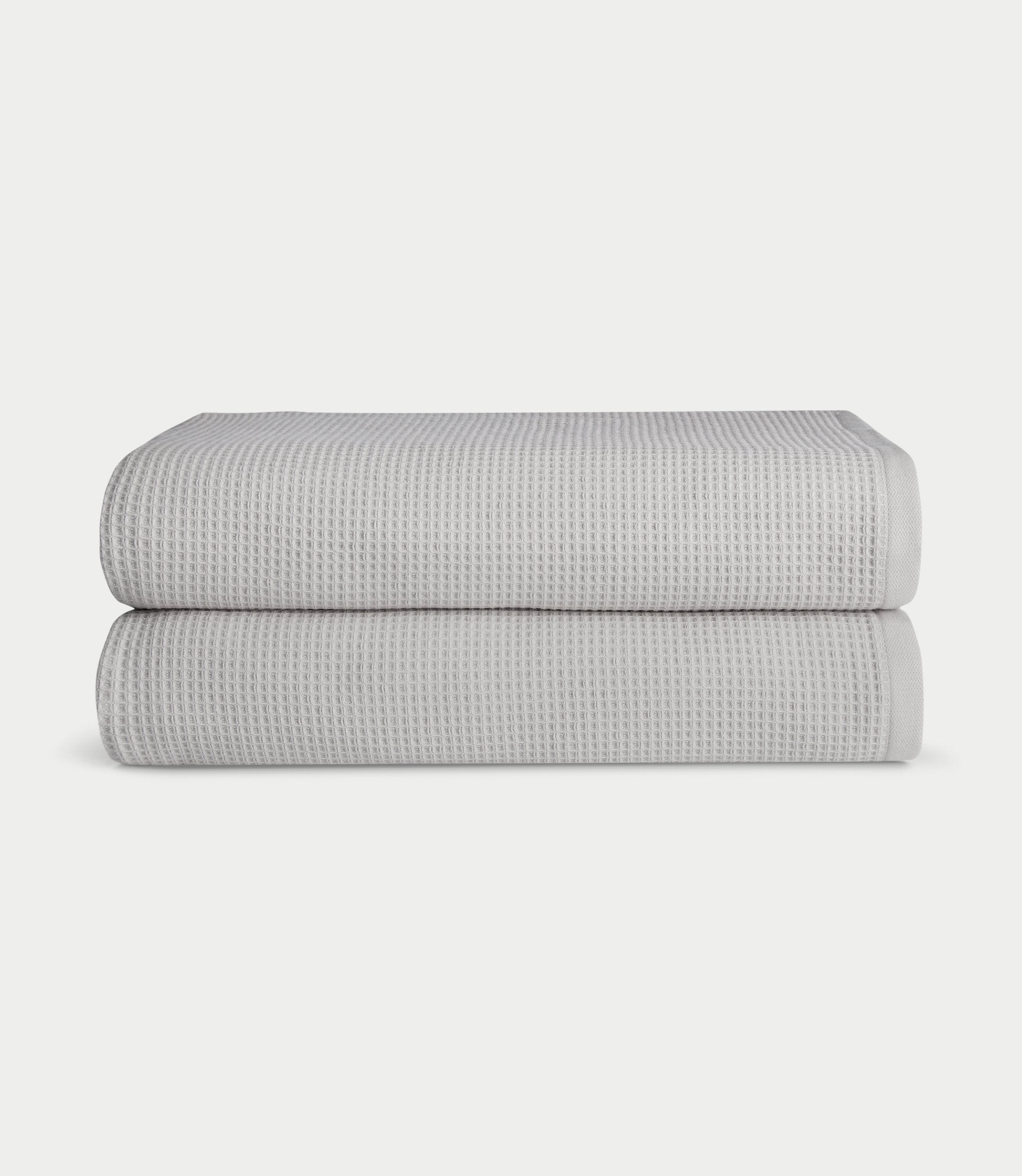 Waffle Bath Sheets in the color Light Grey. Photo of Waffle Bath Sheets taken with white a background. 